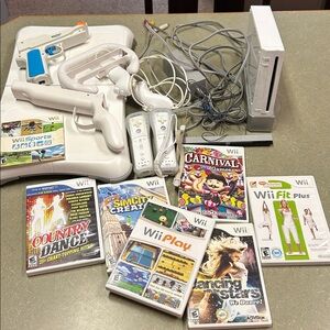 Nintendo Wii Console with White Controllers and Game Collection